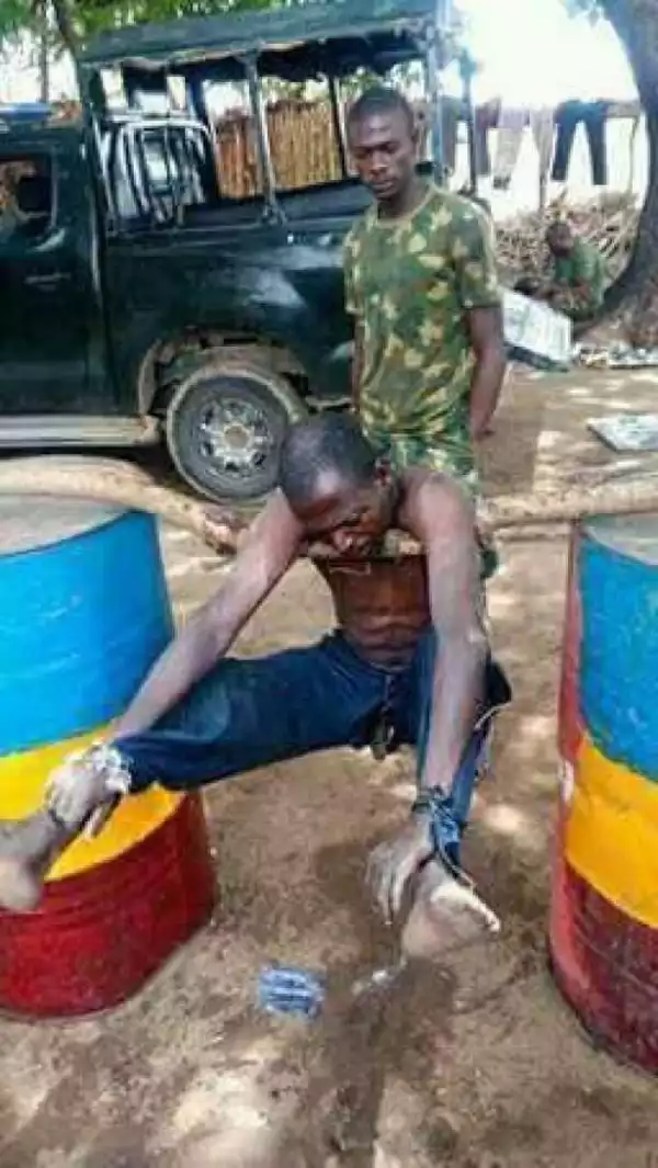 See How This Lecturer Was Served Punishment For Answering A Phone Call At Army Checkpoint (Photo)